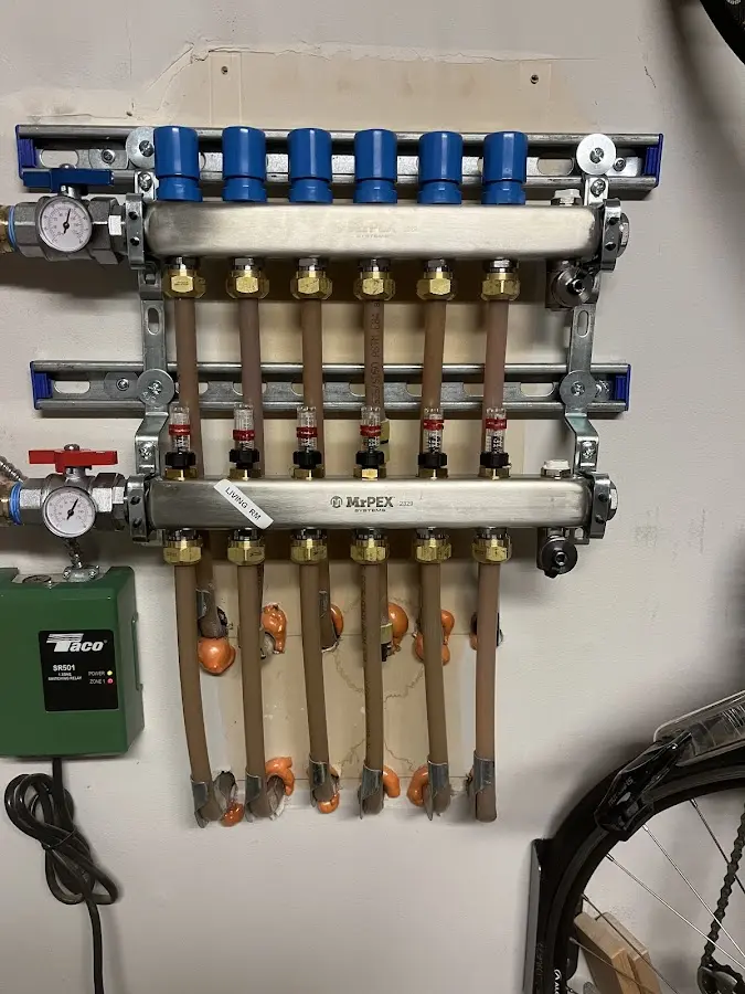 Plumber performing Water Heater Repair at a residential property in Pickens